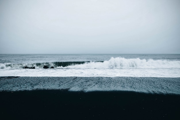 Beautiful scenic view of the sea under a cloudy gloomy sky