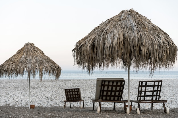 Free photo beautiful sea landscape with beach chairs