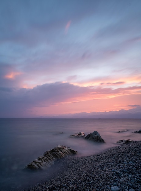 Beautiful seascape at sunset with rock formations in the water