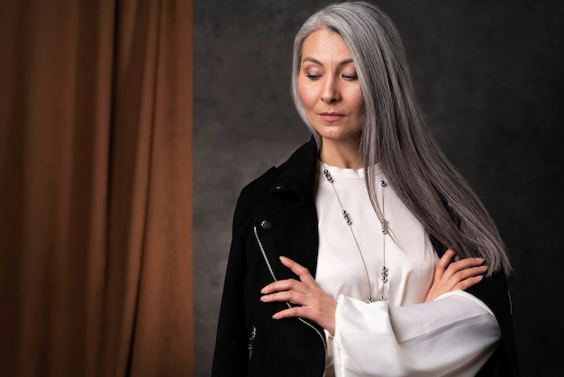 Beautiful senior woman portrait wearing black jacket