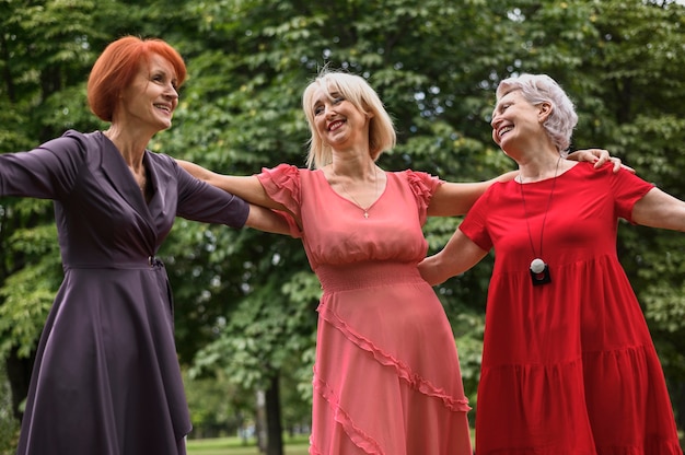 Beautiful senior women together outdoor