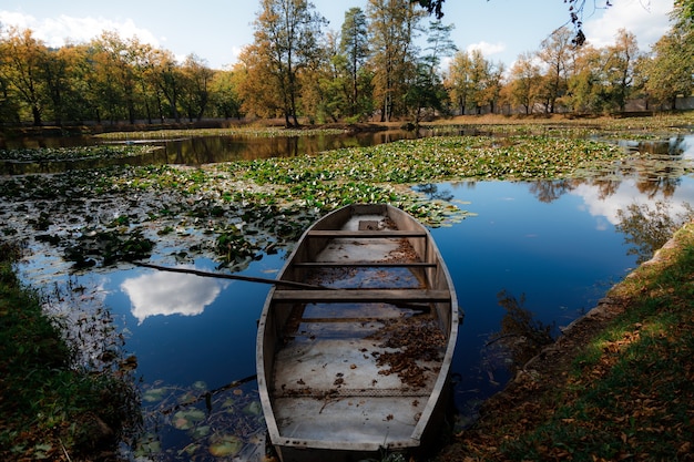 Beautiful shot of a boat in the lakeside of Cesky Krumlov city of Czech Republic