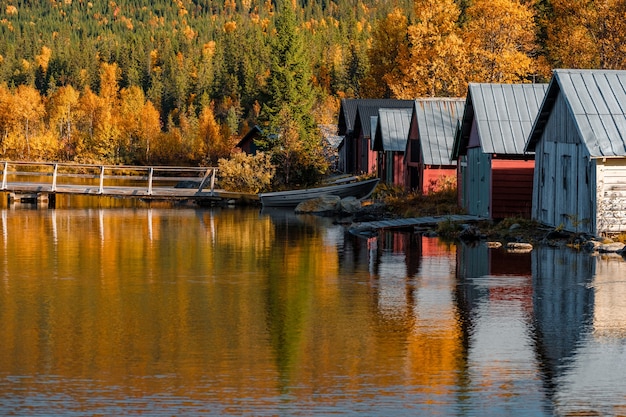 Beautiful shot of boathouses in Autumn