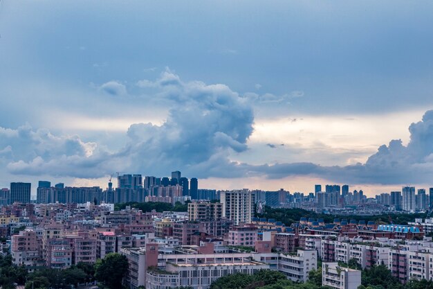 Beautiful shot of buildings under a blue cloudy sky