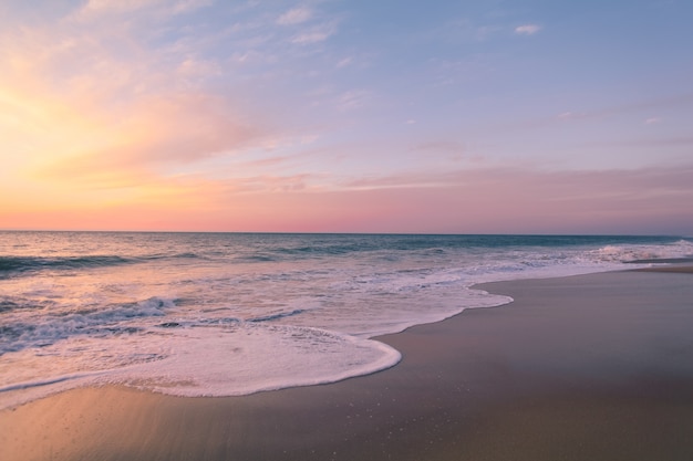 Beautiful shot of the colorful sunset at the beach