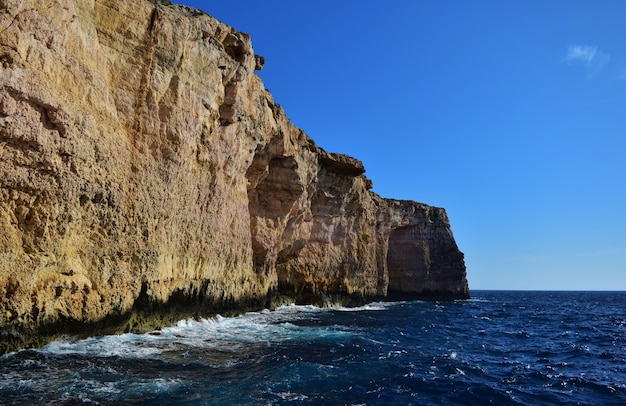 Beautiful shot of coralline limestone sea cliffs in Migra il-Ferha, Maltese Islands, Malta