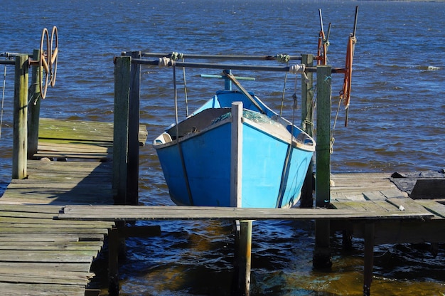 Free photo beautiful shot of a fishing boat on the seashore