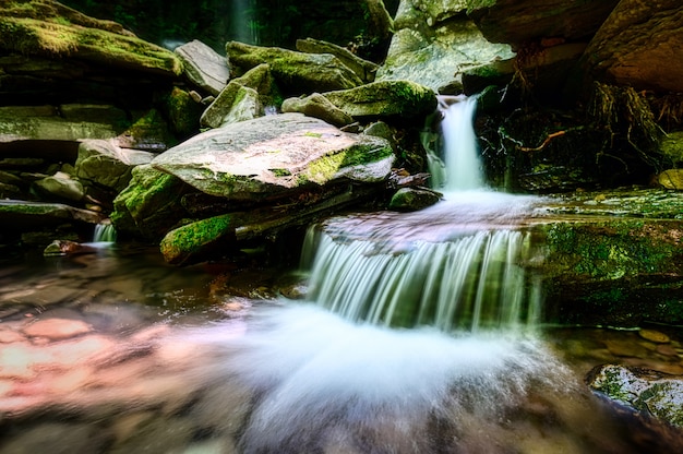 Beautiful shot of flowing river with big rocks