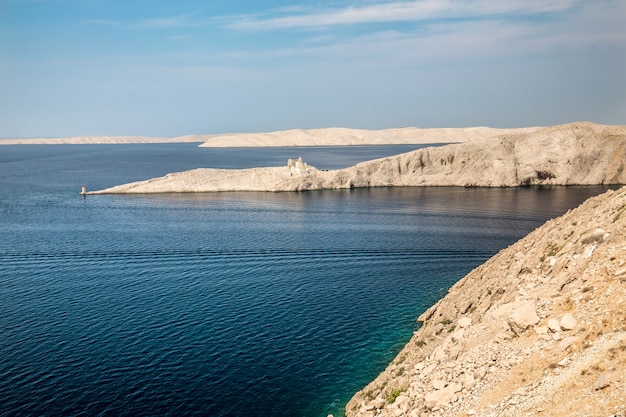 Beautiful shot of the Fortica under a blue cloudy sky in  Miskovici, Croatia