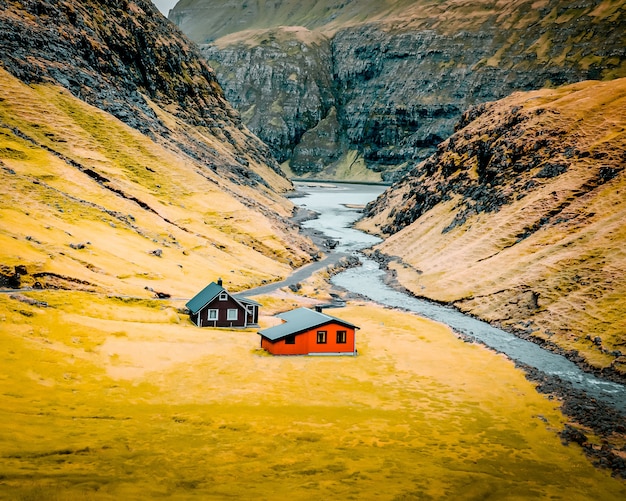 Free Photo beautiful shot of a great natural landscape with few small houses in the middle