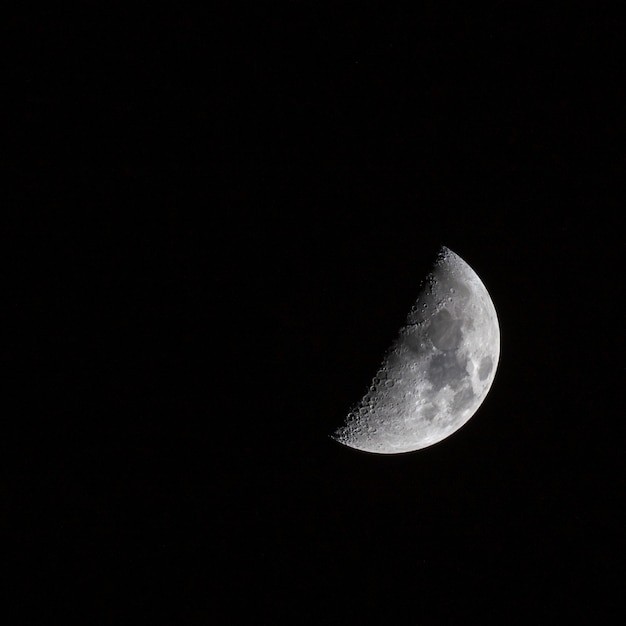 Free Photo beautiful shot of a half-moon in the dark sky