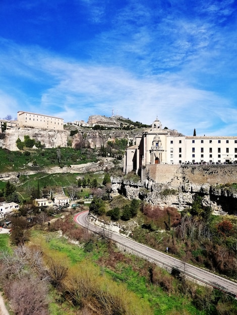 Beautiful shot of the Hanging Houses on the cliff on a sunny day in Cuenca, Spain