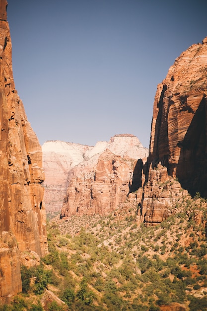 Beautiful shot of high brown cliffs in the canyon