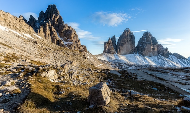 Beautiful shot of the Mountain Tre Cime di Lavaredo in Italian Alp under the shade of the clouds