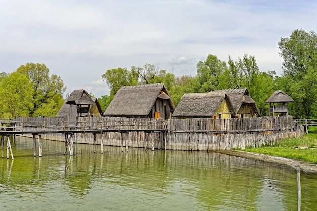 Free photo beautiful shot of pfahlbau museum unteruhldingen uhldingen-mühlhofen germany across waters