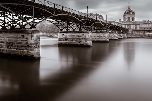 Beautiful shot of The Pont des Arts and Institute de France in Paris, France