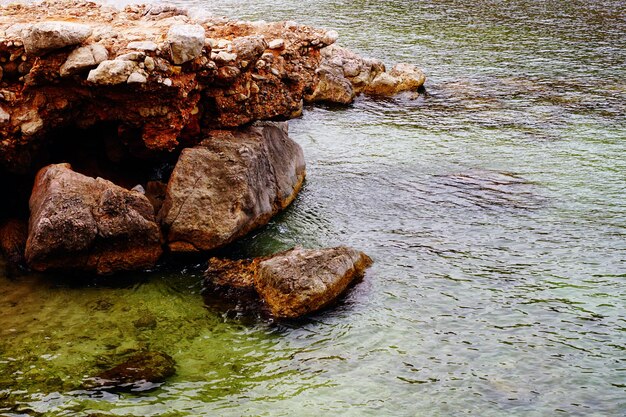 Beautiful shot of a rocky beach during sunny weather