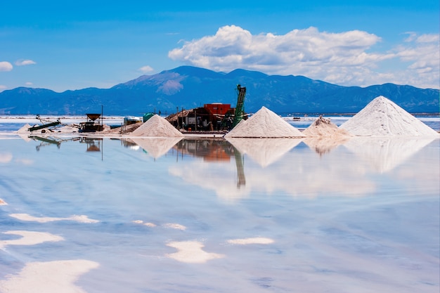 Free photo beautiful shot of a sand mine surrounded with reflective water