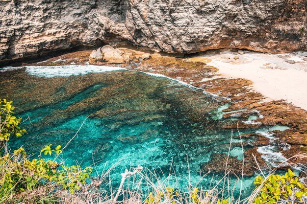 Beautiful shot of sea waves at the seashore during daytime