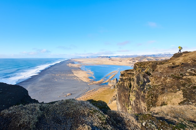 Free photo beautiful shot of the seashore under a clear blue sky at daytime