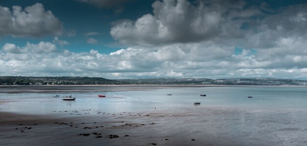 Beautiful shot of a seashore under the cloudy sky