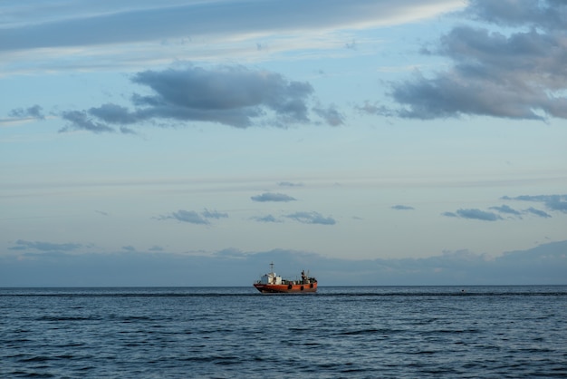 Free Photo beautiful shot of a ship sailing in the sea in south of chile, punta arenas