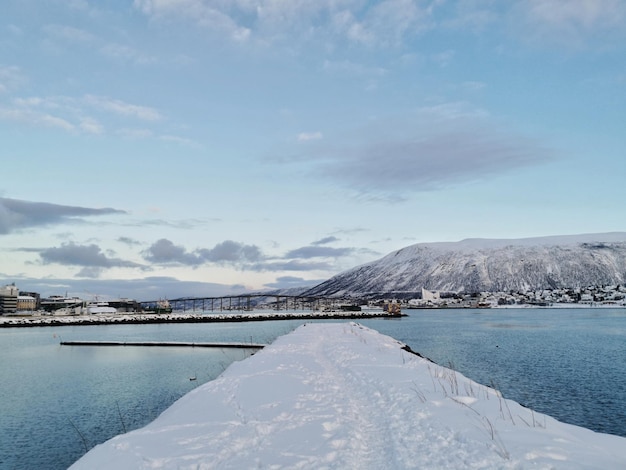 Beautiful shot of snowy lake scenery in Tromso, Norway