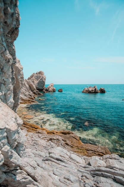 Beautiful shot of a tropical island surrounded by clear water on a sunny day