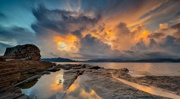 Beautiful shot of Tung Ping Chau in Hong Kong under the yellow and dark blue sky