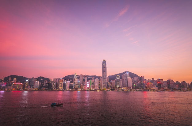 Beautiful shot of an urban city modern architecture with the breathtaking sky and a lake