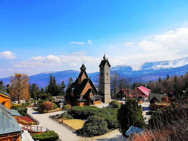 Free photo beautiful shot of wang church and a tower in karpacz, poland