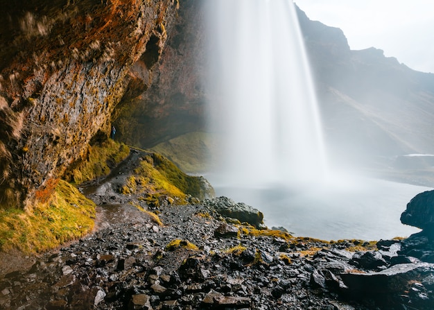 Free Photo beautiful shot of a waterfall in rocky mountains