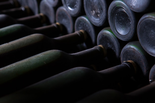 Free Photo beautiful shot of wine bottles arranged in order