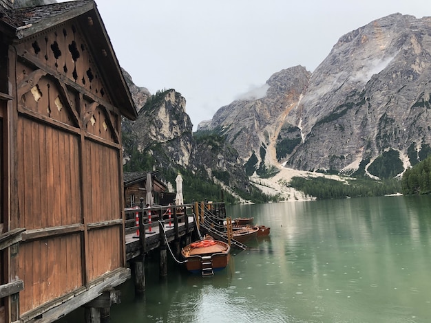 Beautiful shot of wooden boats on Braies lake