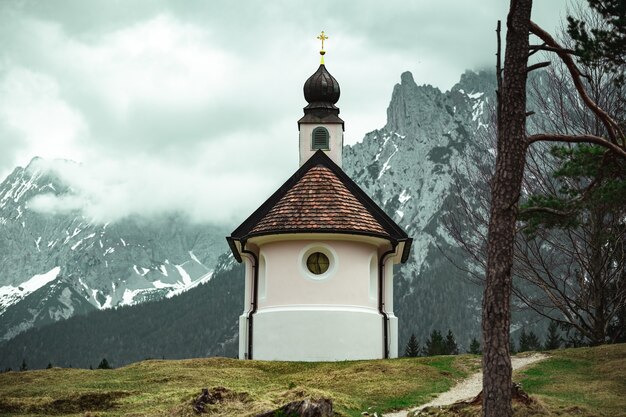 beautiful small catholic church in the mountains of the Bavarian Alps