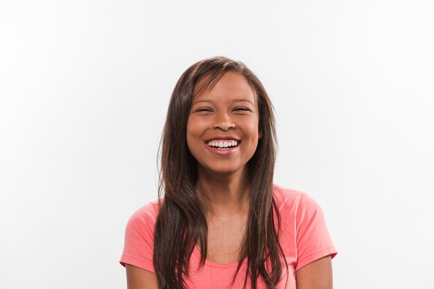 Beautiful smiling teenage girl on white background