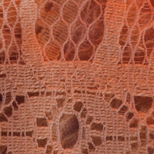 Beautiful textile material in fine mesh in redness 