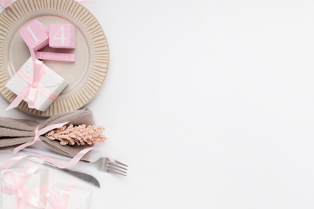 Beautiful top view table setting for Valentines on white