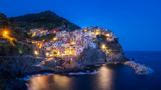 Beautiful view of lights in manarola village of cinque terre italy