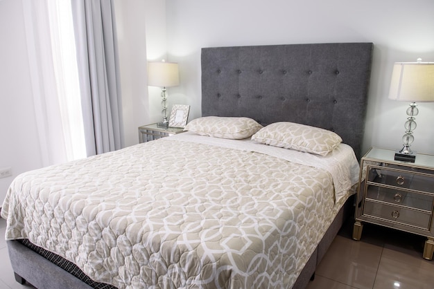 Beautiful view of a modern bedroom in white colors