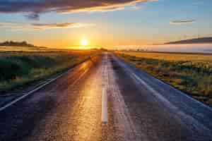 Free photo beautiful view of a road at sunrise in the early morning