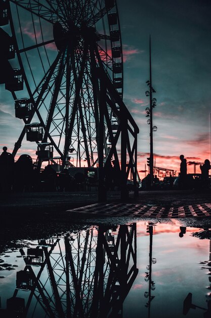 Beautiful view of a tall Ferris wheel in Marseille, France in the evening