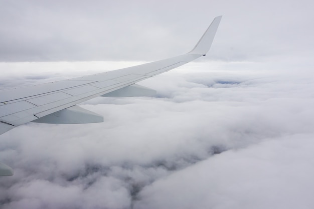 Free Photo beautiful view on the white clouds from the plane window