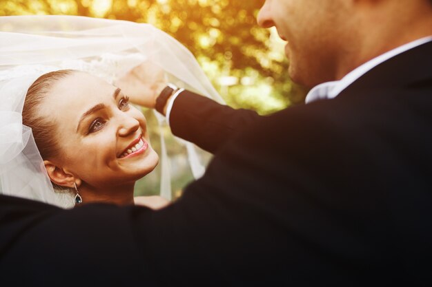 Free Photo beautiful wedding couple posing in forest