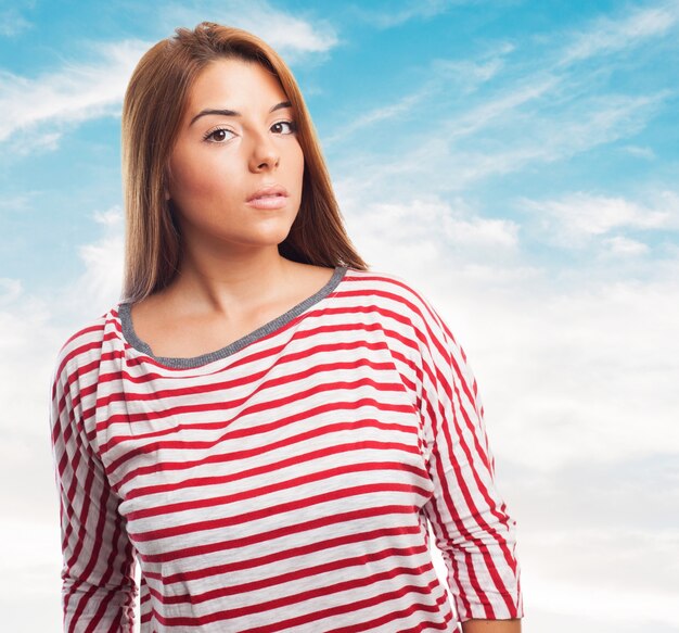 Beautiful woman against a background of sky