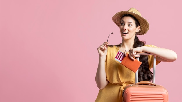 Beautiful woman being ready to travel with copy space