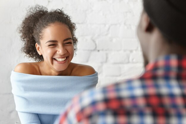 Beautiful woman at a cafe with boyfriend