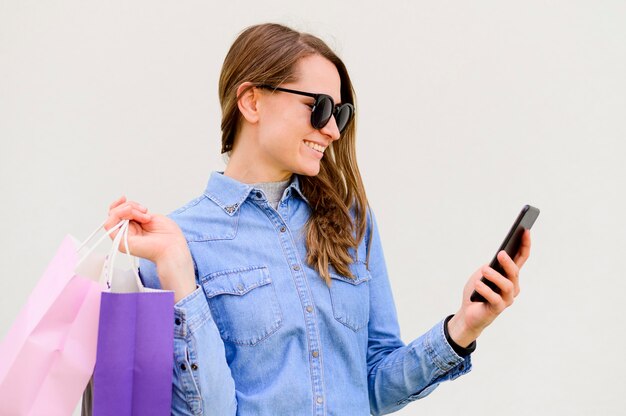 Beautiful woman carrying shopping bags