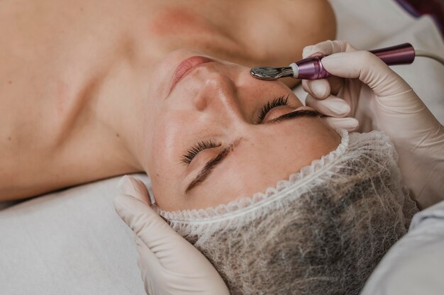 Beautiful woman during a cosmetic treatment at the spa