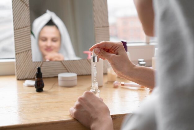 Beautiful woman doing a self care treatment